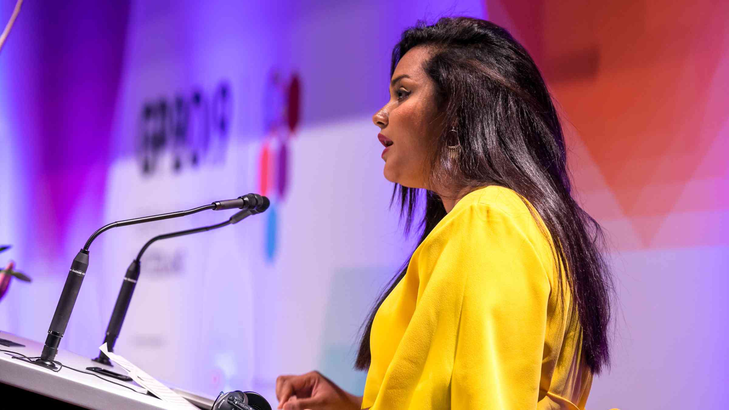 Young woman speaking at Global Platform